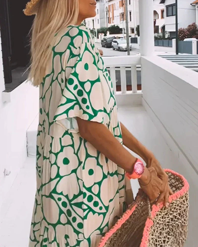 CHRISTINE | Lange Zomerjurk met Vloeiende Snit en Elegante Grafische Motief
